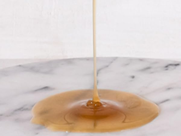Leonor Greyl clarifying bottle pour demonstrates buildup removal potential.