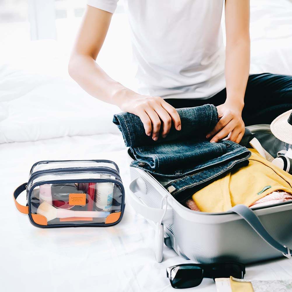 Lermende clear toiletry bag in use on counter demonstrates convenient travel organization.
