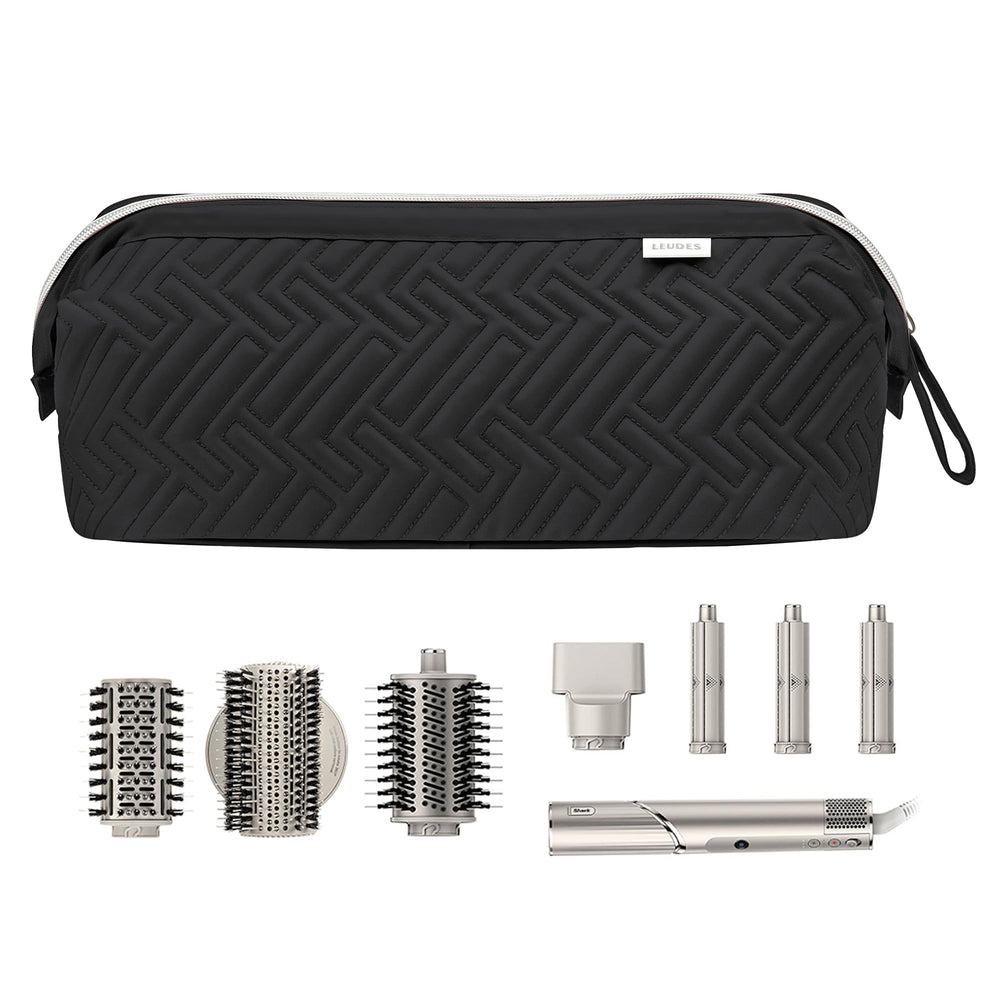 Leudes travel bag features two clear zipper pockets for accessories.