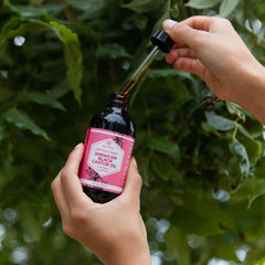 Leven Rose JBCO label closeup showing pure organic formula for skin and scalp.