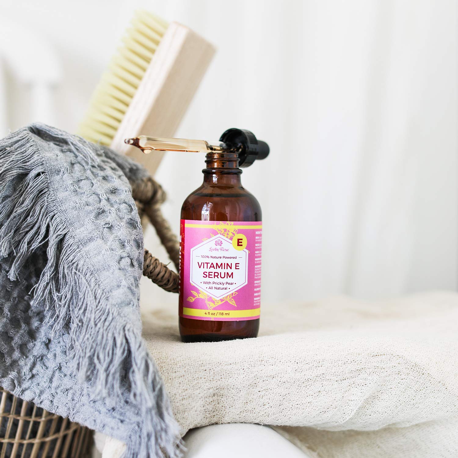 Leven Rose Vitamin E Oil Serum on hand shows quick moisturizing touch.