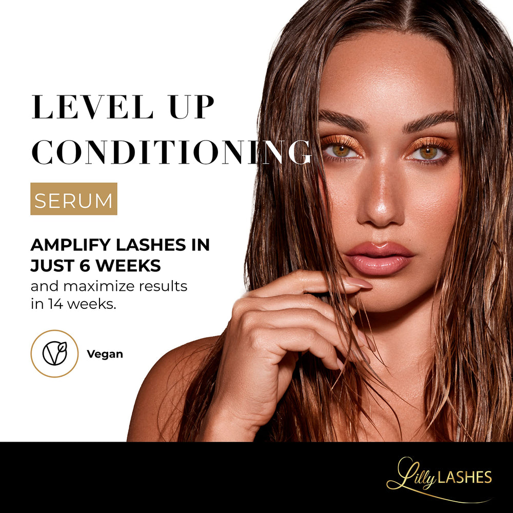 Lilly Lashes Level Up wand applying serum along lash line for nightly conditioning