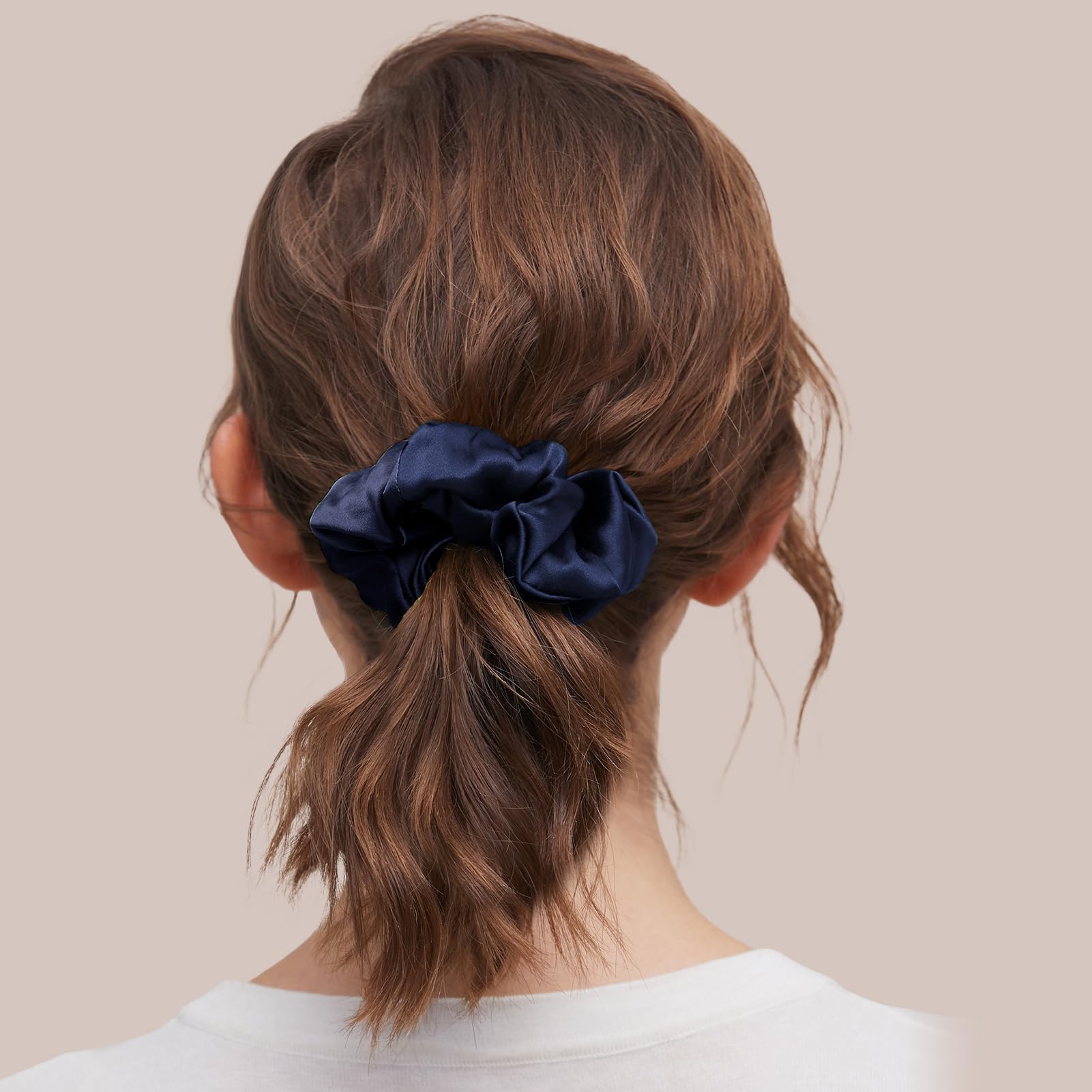 LilySilk navy scrunchie wrapped band shows 100% Mulberry Silk for minimal snag