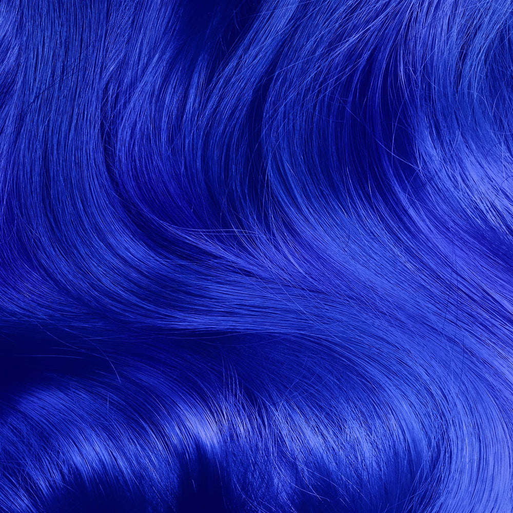 Lime Crime Unicorn Hair Dye Mystic blue swatch highlights vibrant color possibilities and conditioning.