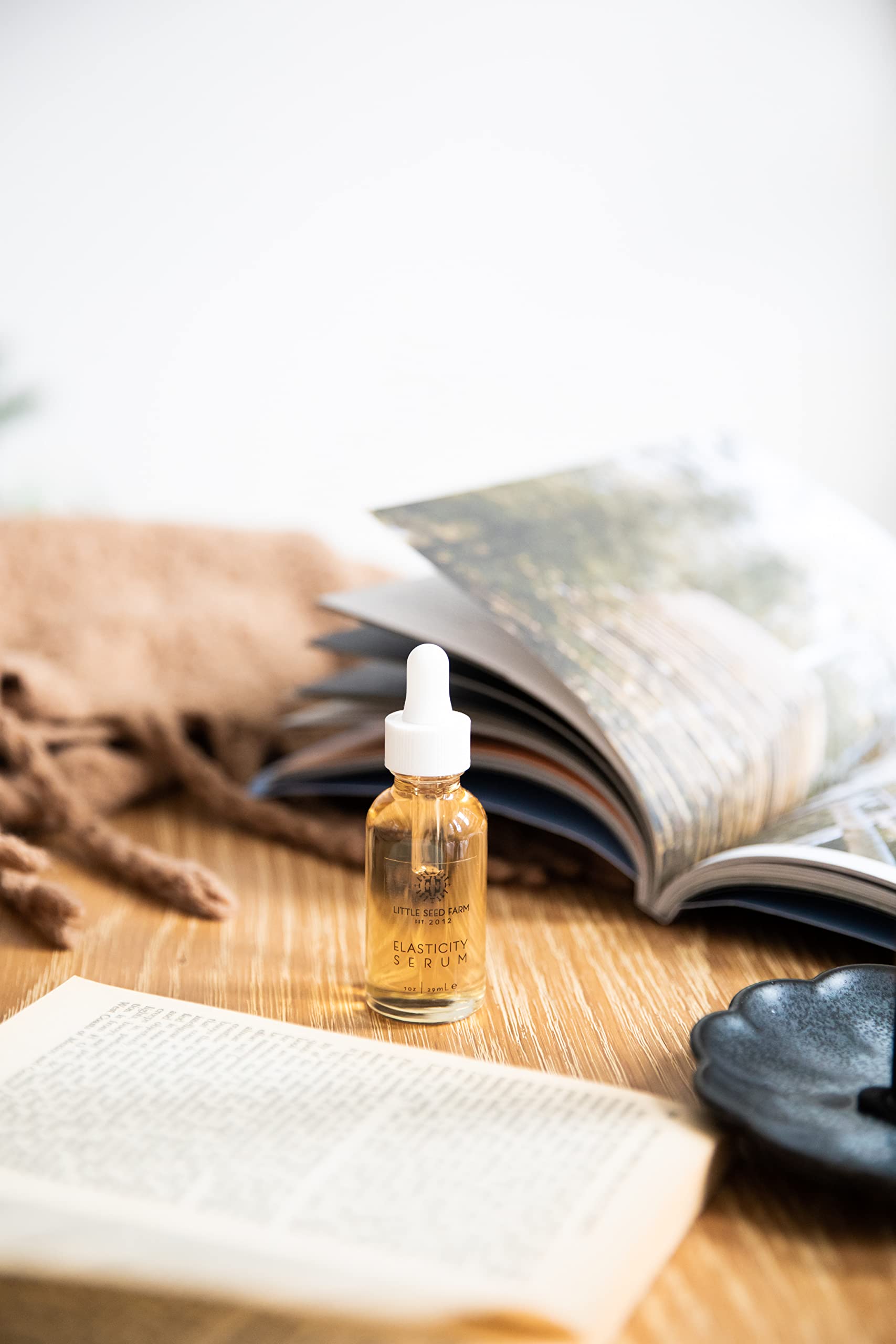 Little Seed Farm Elasticity Serum used under makeup during daily routine.