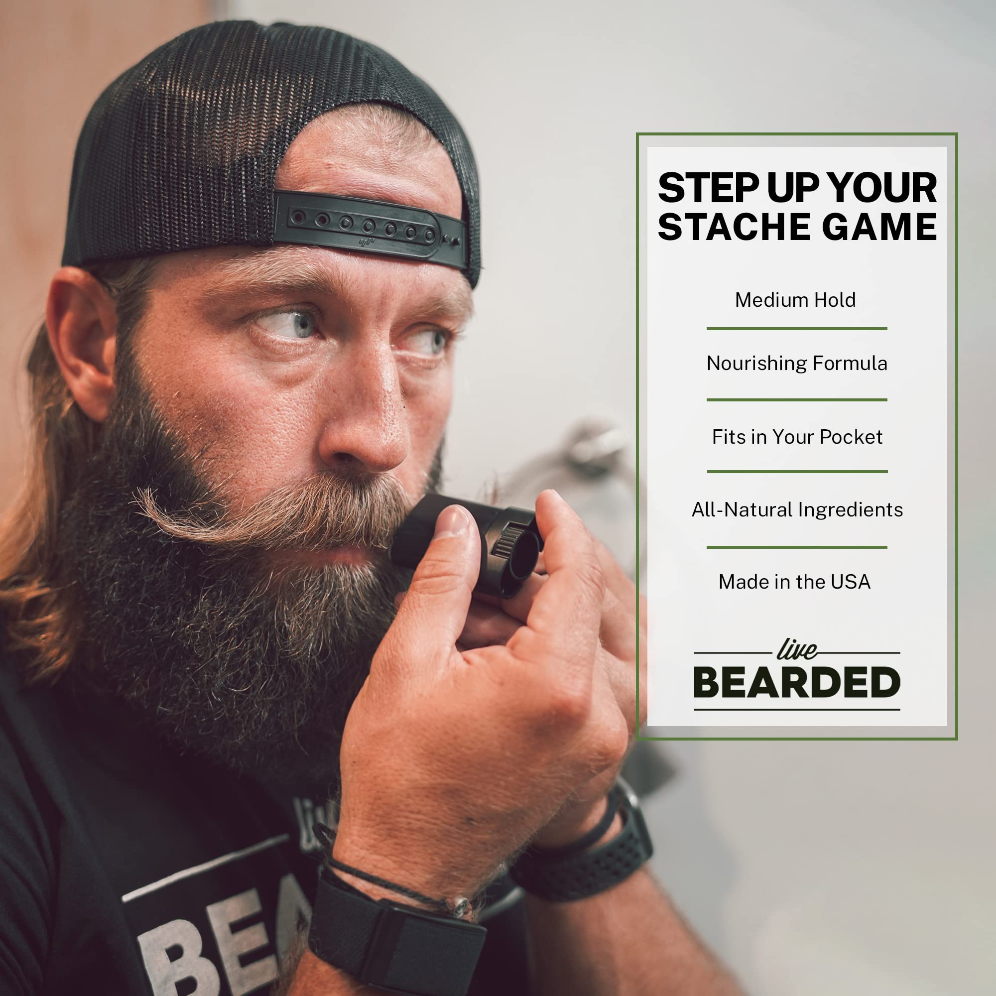 Live Bearded Mustache Wax Stick in use shows hands shaping stache for day-long hold.