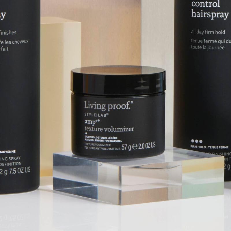 Living Proof Amp Texture Volumizer hair lifted with soft manageability and volume.