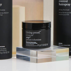 Living Proof Amp Texture Volumizer hair lifted with soft manageability and volume.