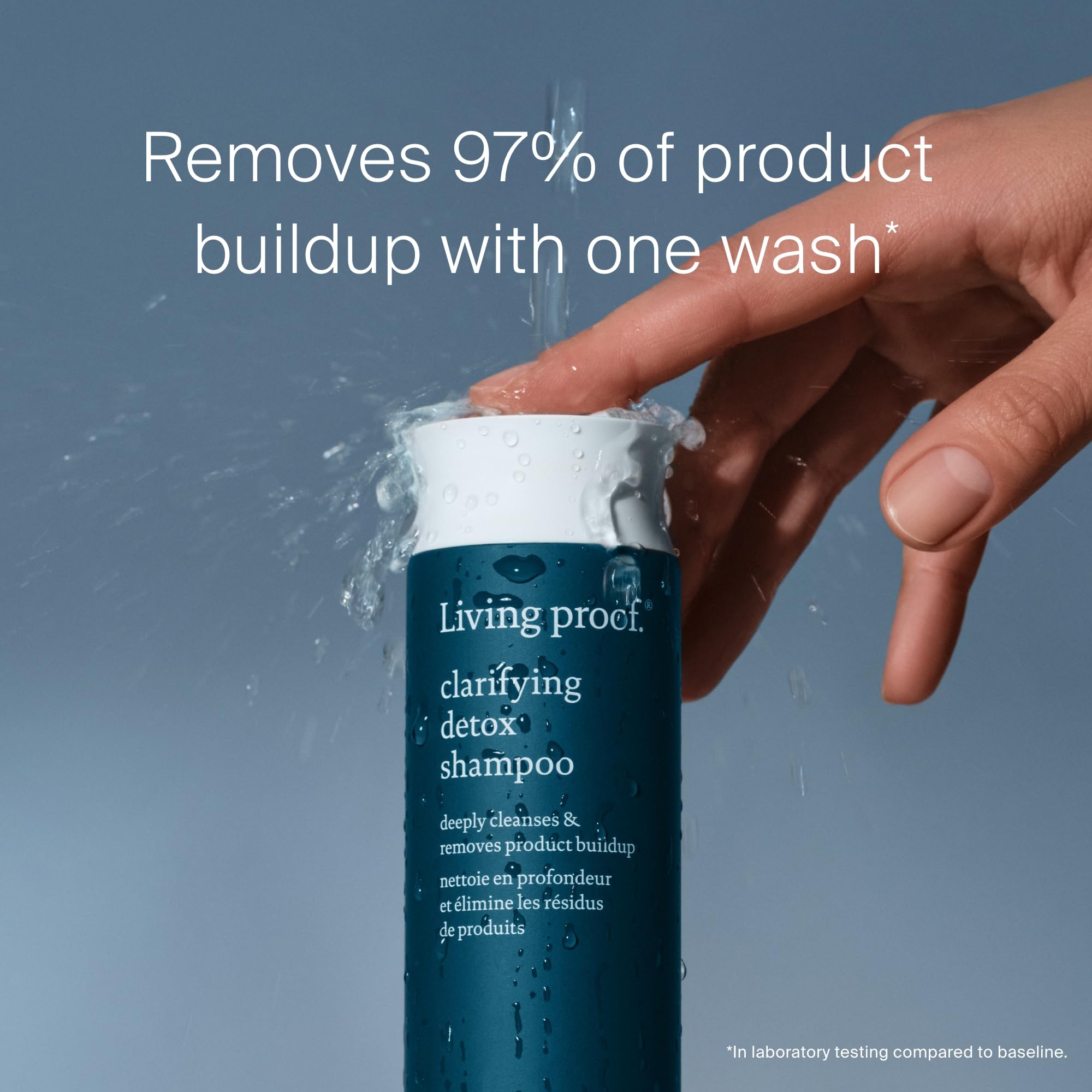 Living Proof Clarifying Detox Shampoo pour demonstrates even distribution for quick cleansing.