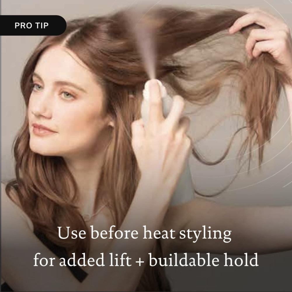 Living Proof Full Dry Volume Spray lifts fine hair in close-up shot