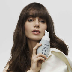 Living proof Full Texturizing Foam on dry hair revives lift with touchable body.