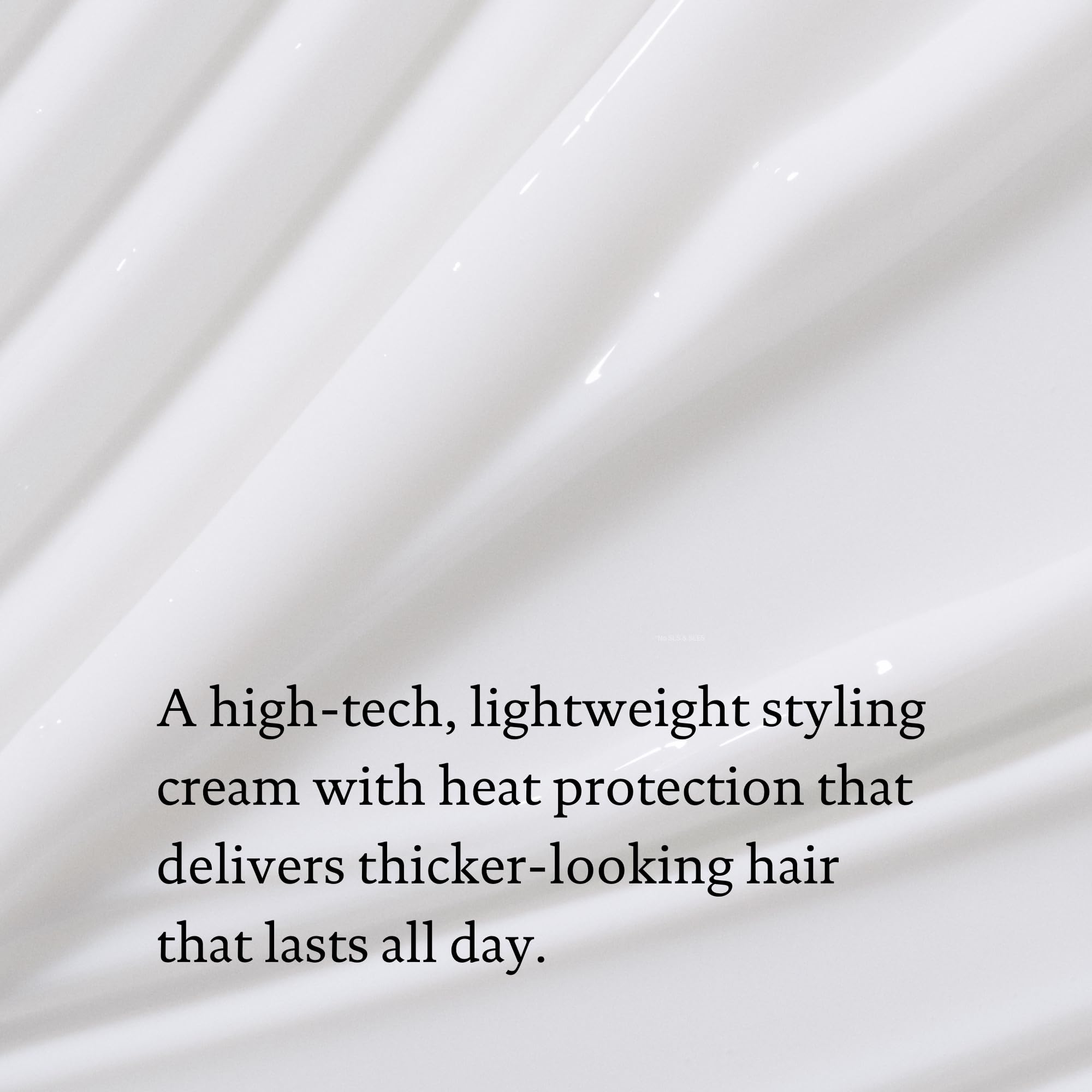 Living Proof Full Thickening Blow-Dry Cream creates glossy, voluminous finish.