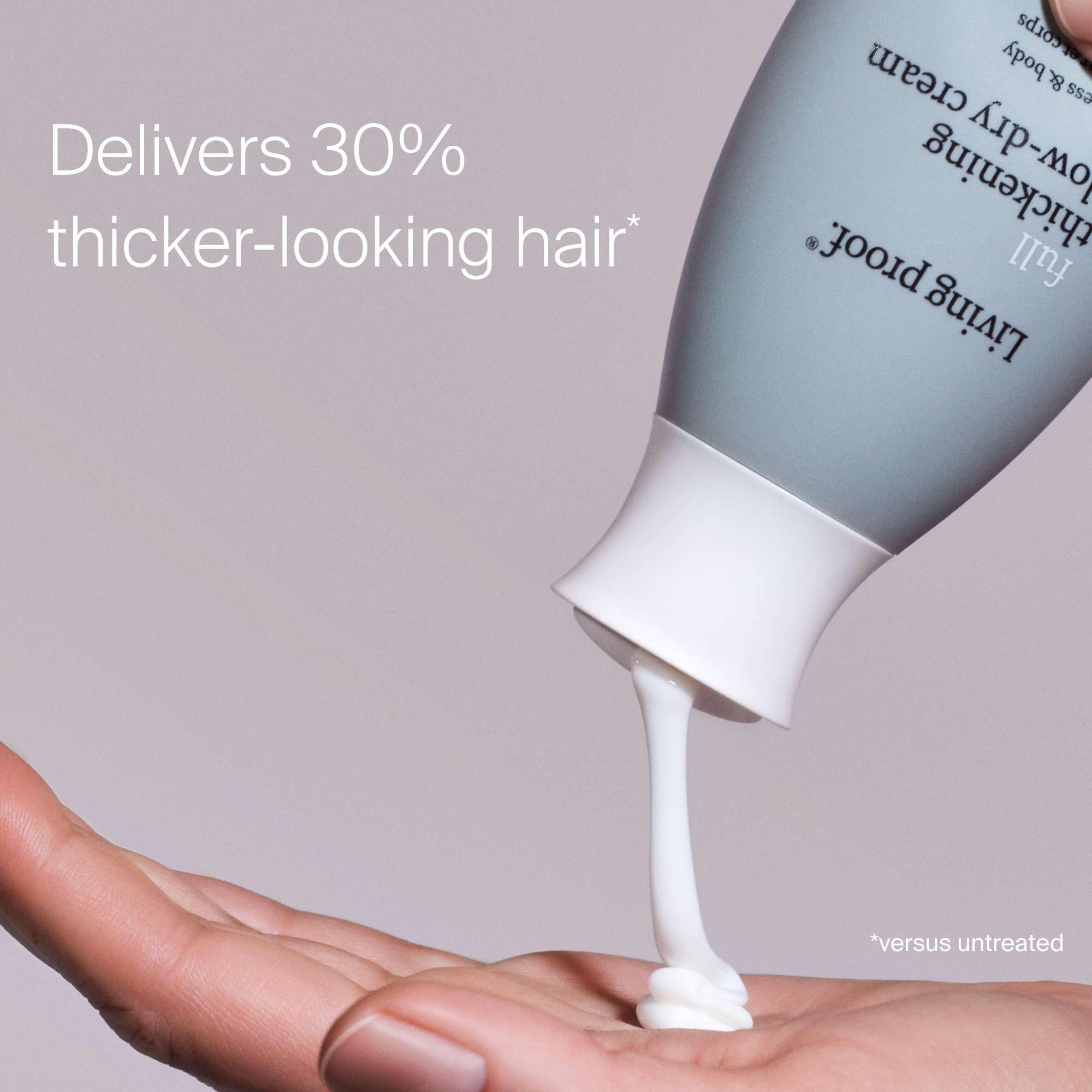 Living Proof Full Thickening Blow-Dry Cream texture close-up shows creamy consistency.