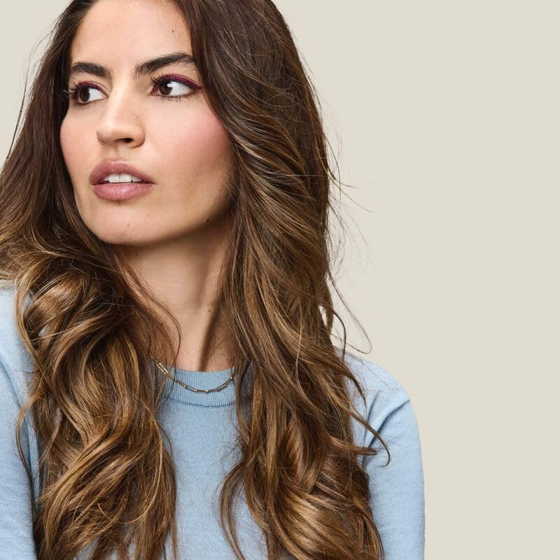 Living Proof Perfect Hair Day 5-in-1 application on damp hair boosts volume