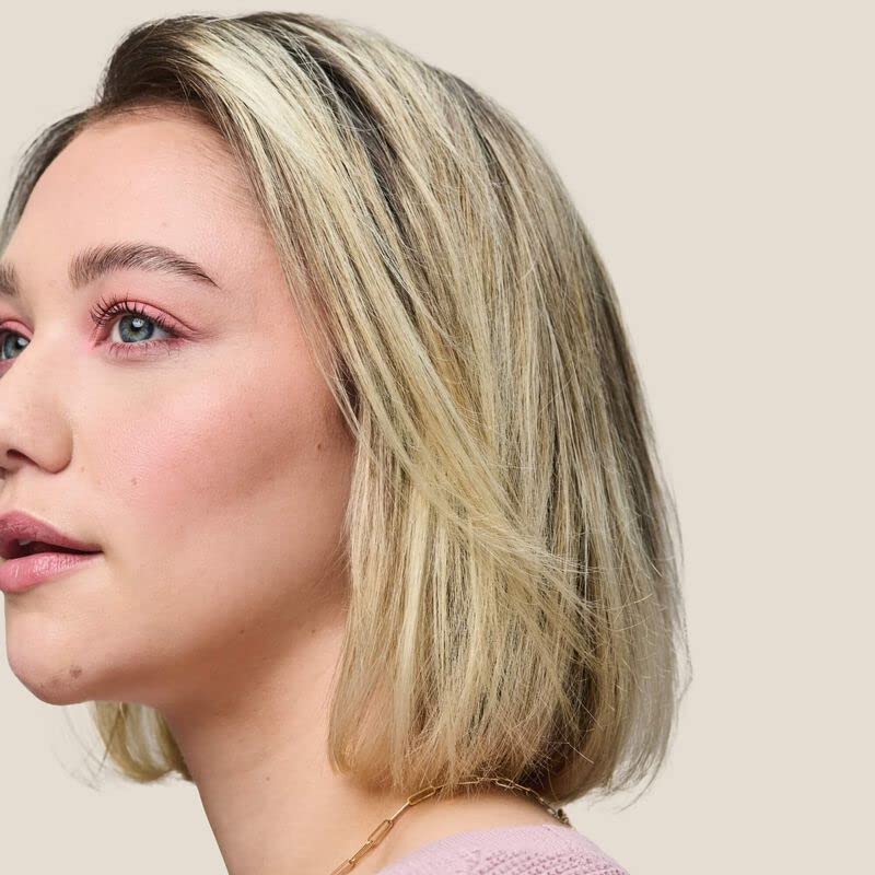 Living Proof Restore Repair Mask tub on sink highlights weightless conditioning without weighing hair down