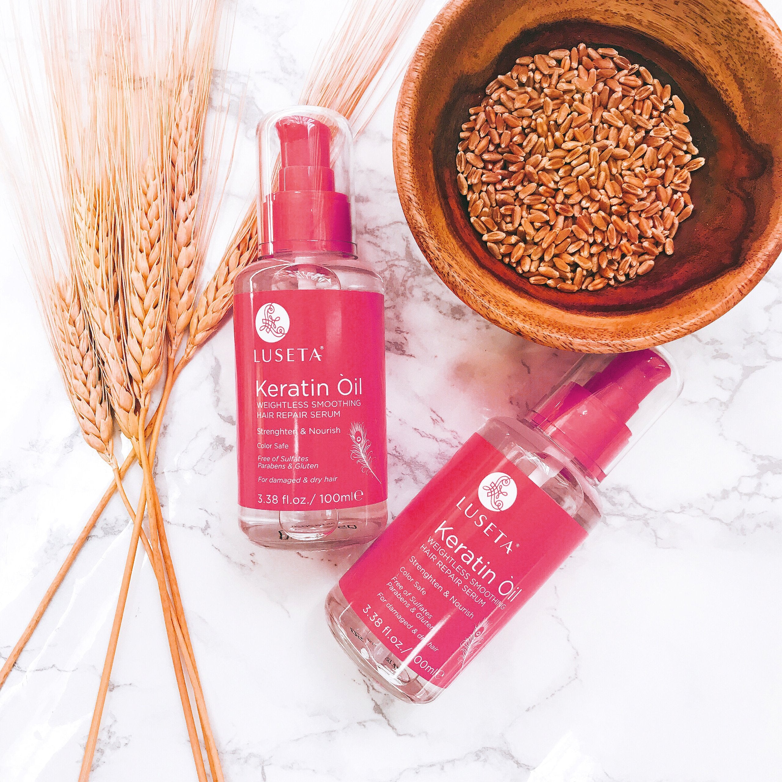 Luseta keratin hair oil serum on dry hair ends for frizz control