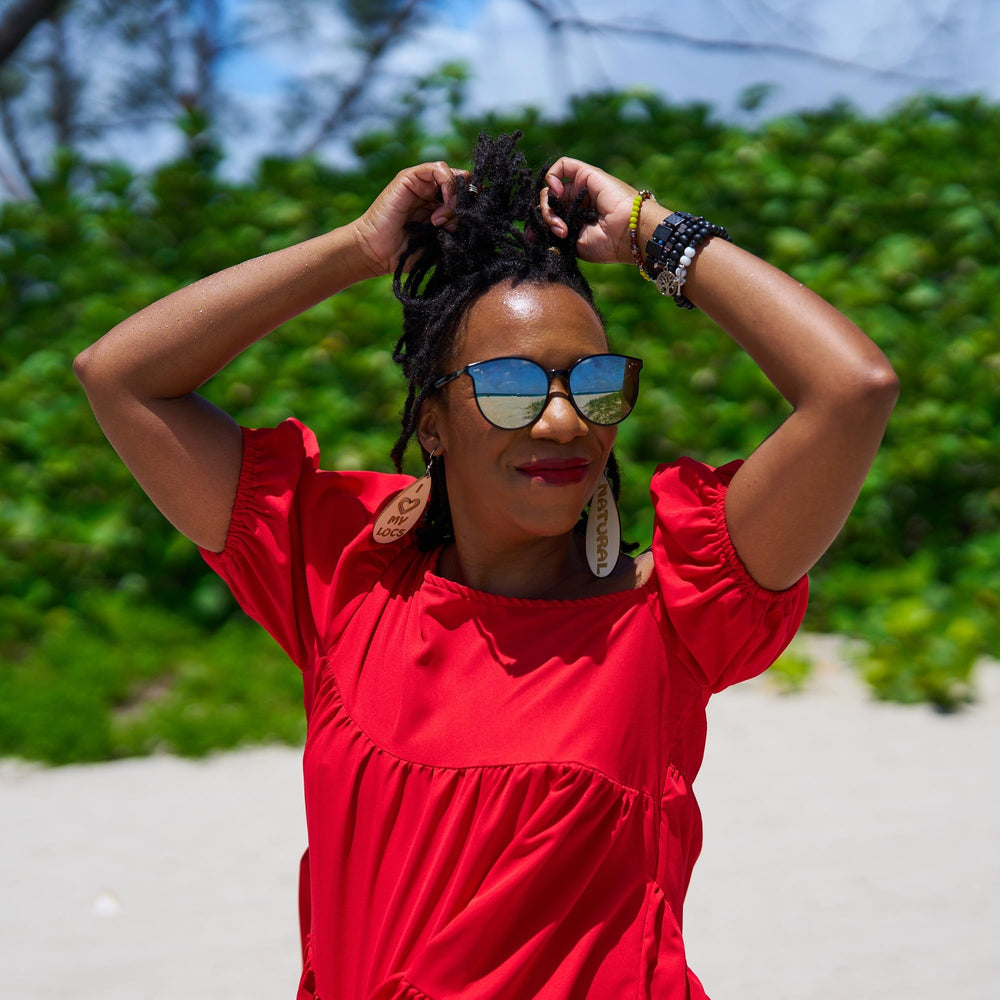 Locsanity Grapefruit Coconut & Lime dreadlocks refresh shows quick spray for refreshed locs.