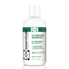 LOCssentials Clarifying Shampoo bottle with peppermint and tea tree oils for refreshed locs.