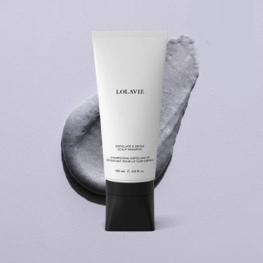 LolaVie Exfoliate & Detox Scrub bottle pump closeup highlights impurity removal.