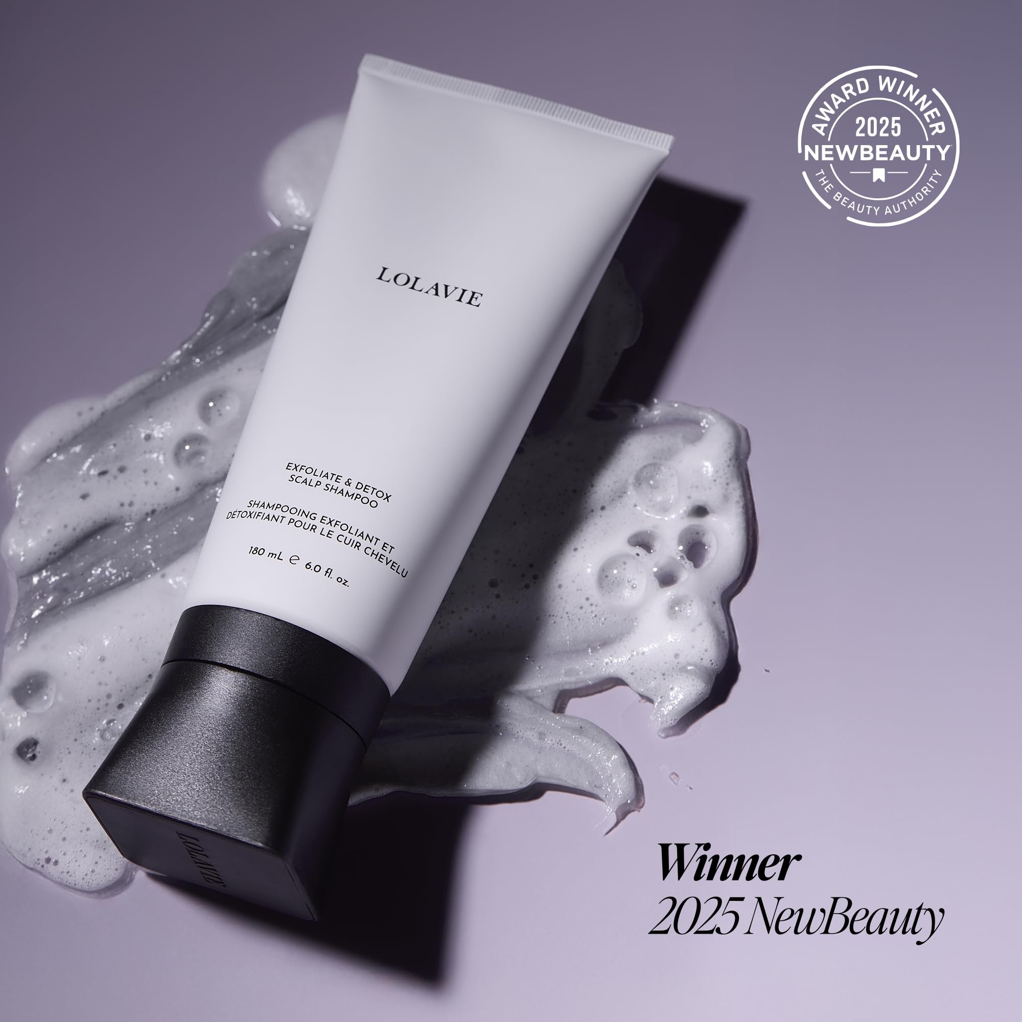 LolaVie Exfoliate & Detox Scrub at roots shows targeted buildup removal application.