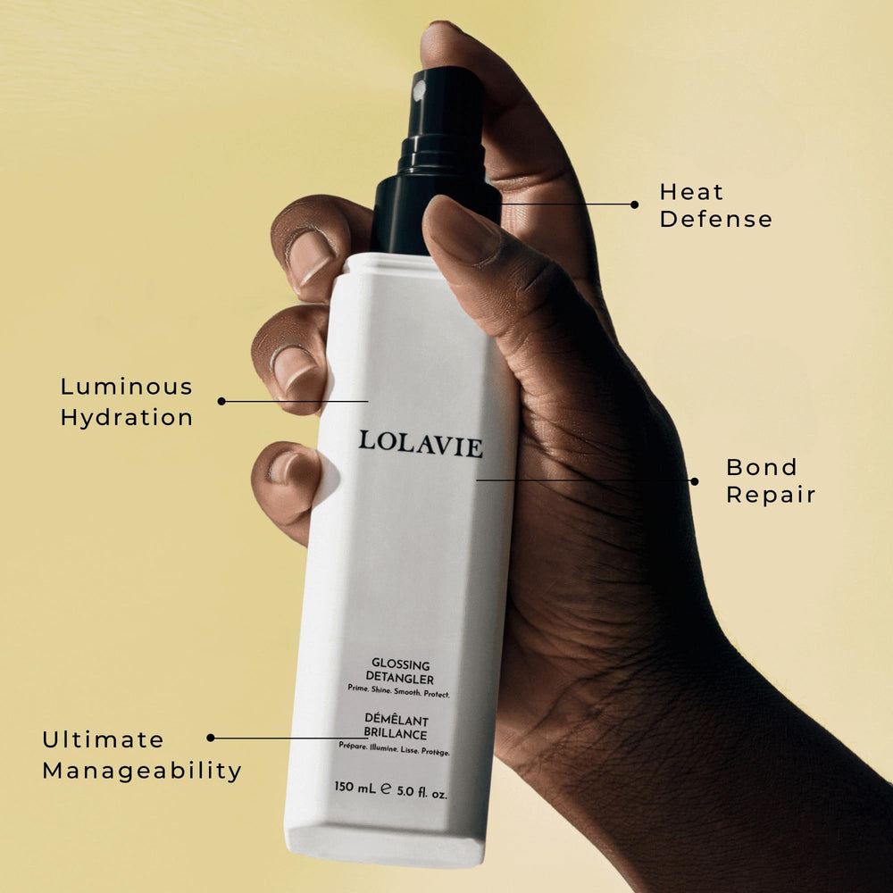LolaVie Glossing Detangler being applied to wet hair for easier detangling