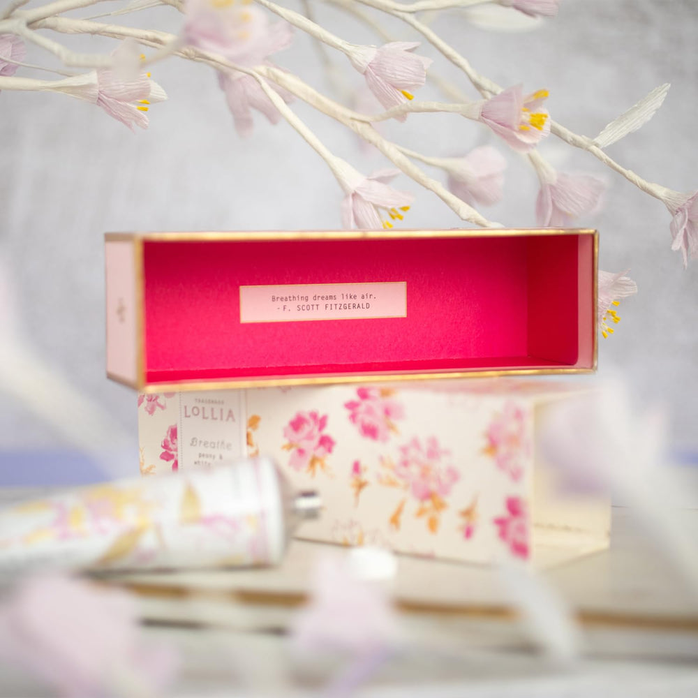LOLLIA Breath sliding-drawer box reveals elegant packaging and peony-lily inspiration.