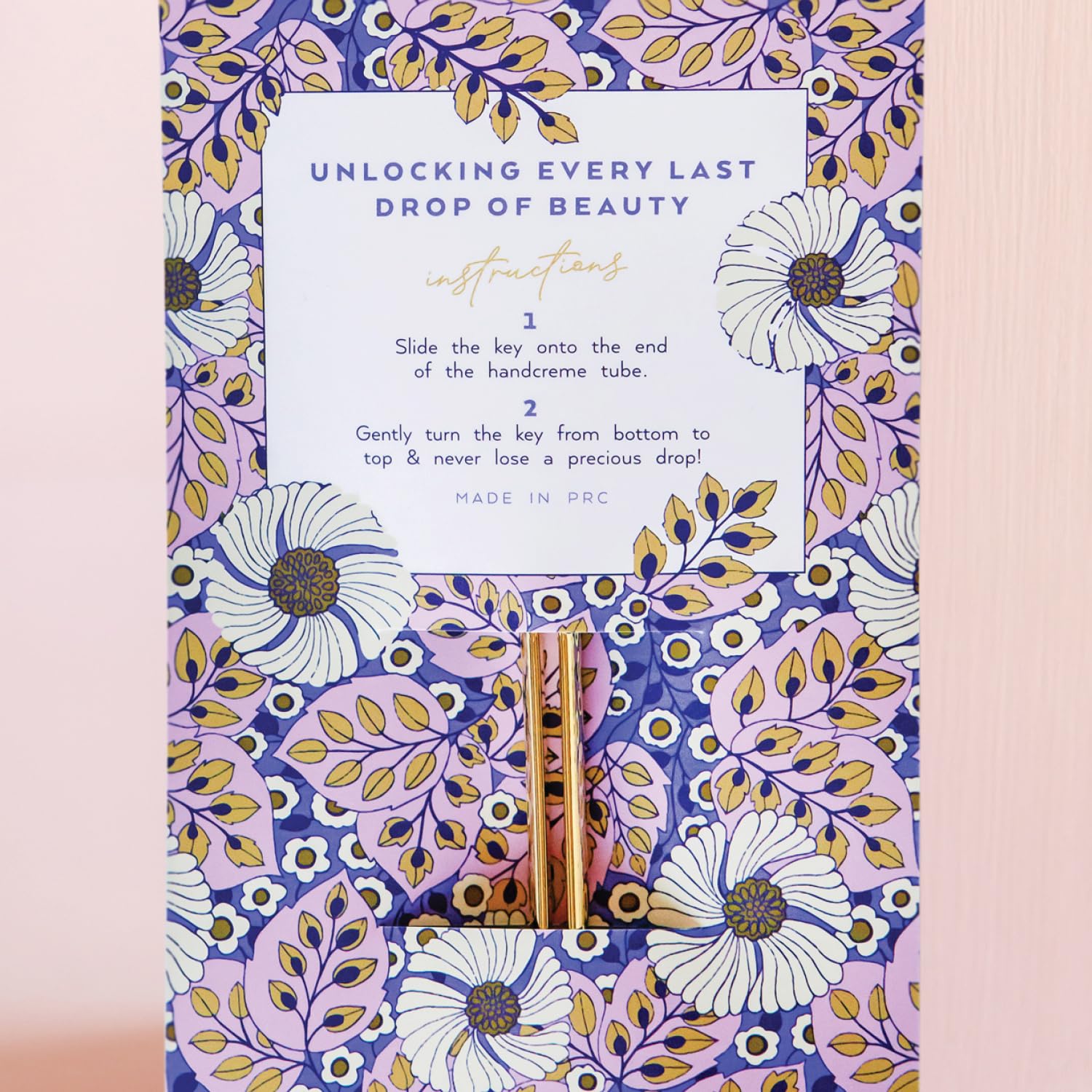 LOLLIA key tucked in floral card pocket ready to gift and display benefit