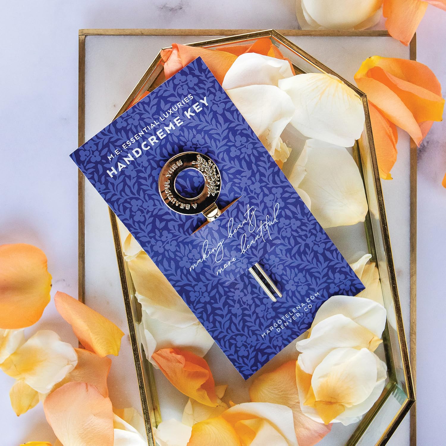 LOLLIA key on bathroom vanity with creams illustrating stylish storage benefit