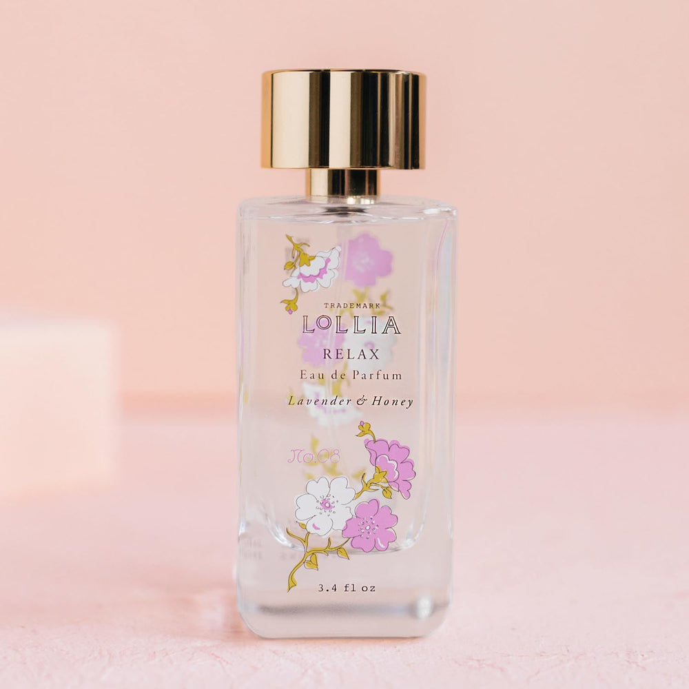 Close-up of blossom detailing on LOLLIA Relax bottle for gifting appeal