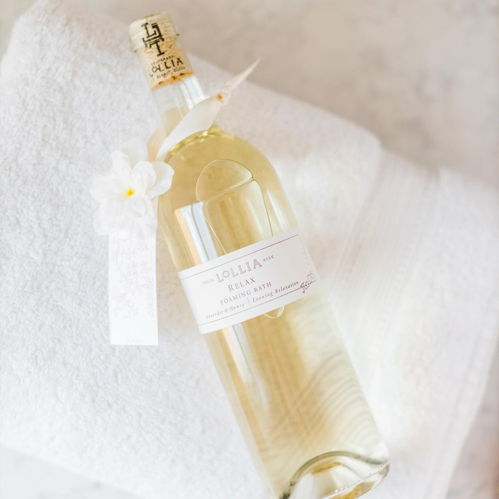 Lollia Relax Bubble Bath pour sequence showing luxurious bubbles rising