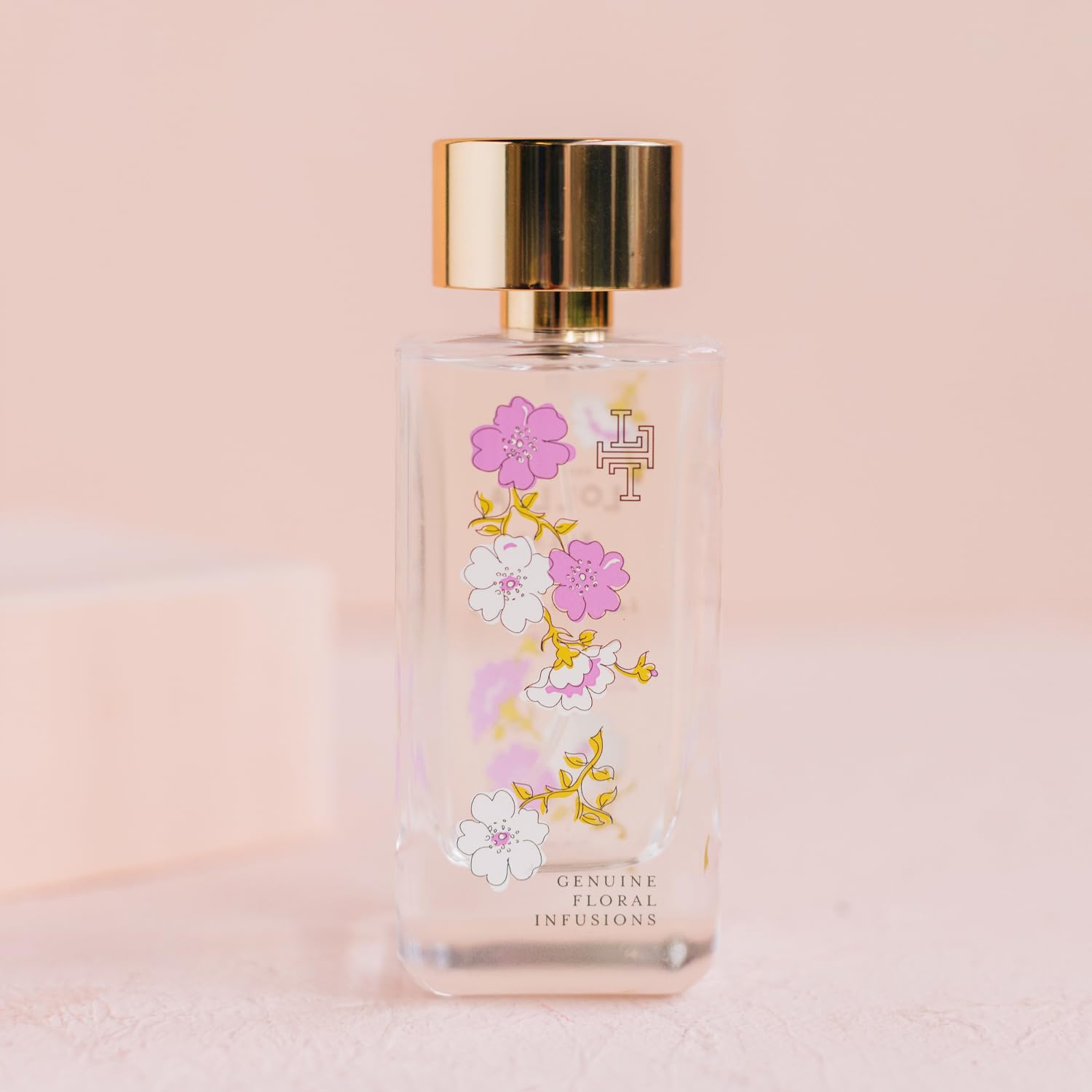 Bottle shows floral pattern suggesting calming ambience and elegance