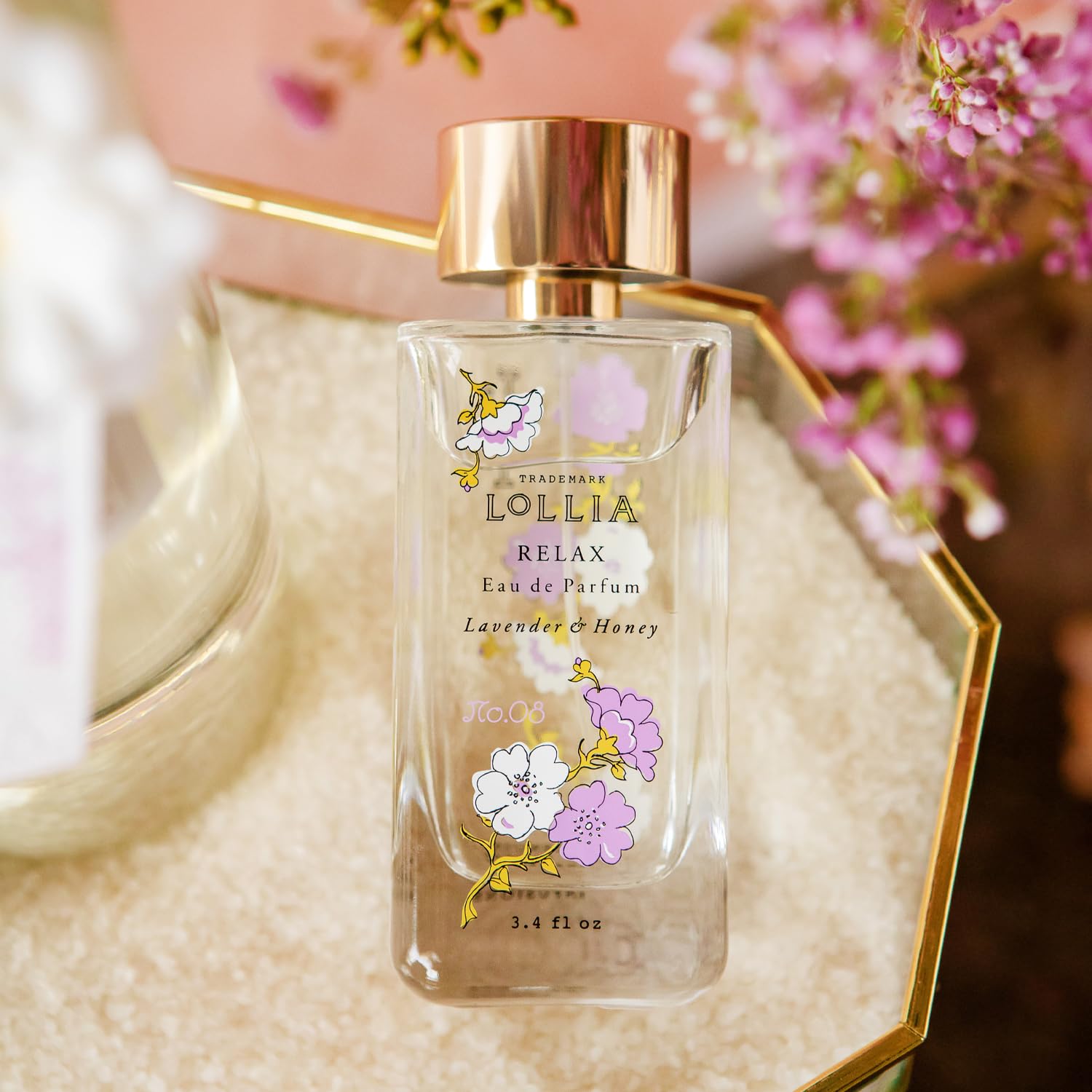 Decorative glass bottle of LOLLIA Relax elevates a luxe vanity display