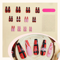 Lomxene candy cane pattern nails for playful holiday vibes