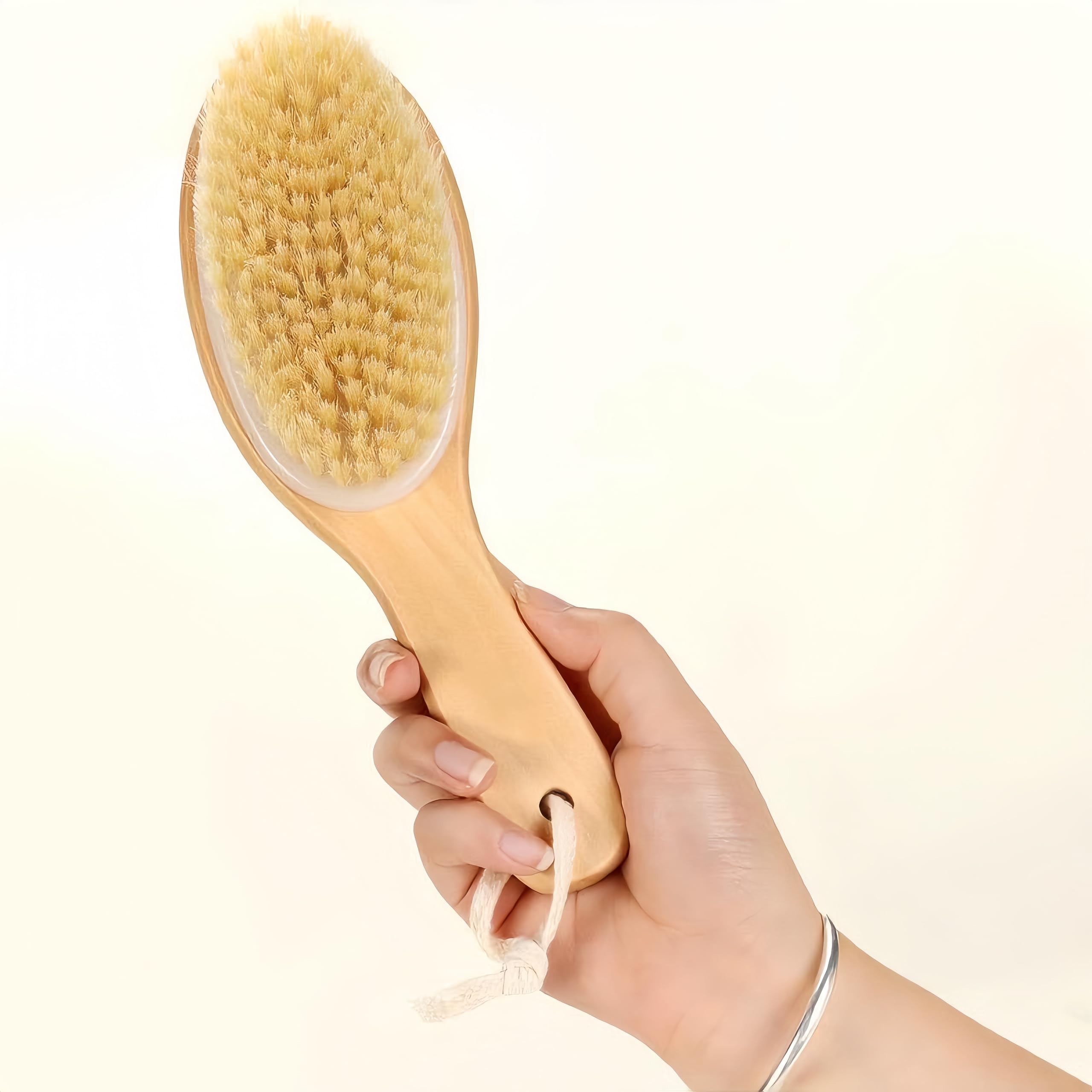 LONGCO contoured handle usage on legs and arms for better control during dry brushing routine.