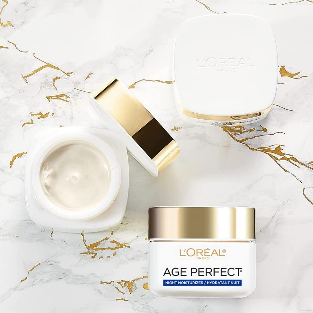 L'Oreal Paris Age Perfect Night Cream container on vanity communicates overnight resilience.