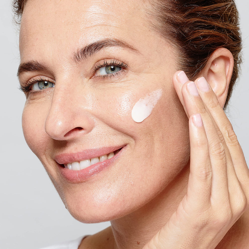 Niacinamide detail on L'Oreal Paris Age Perfect packaging hints at brighter, more even skin tone.
