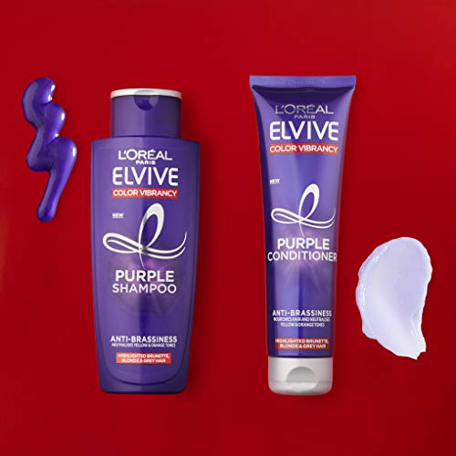 Elvive Color Vibrancy purple shampoo lather showing tone-correcting action.