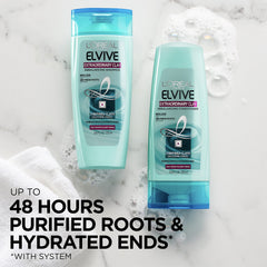 L'Oréal Paris Elvive Extraordinary Clay conditioner jar shows creamy texture for hydrating ends.