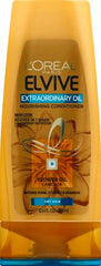L'Oreal Paris Elvive Extraordinary Oil Conditioner dispense shows easy, lightweight application