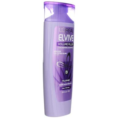 Elvive Volume Filler display with four bottles