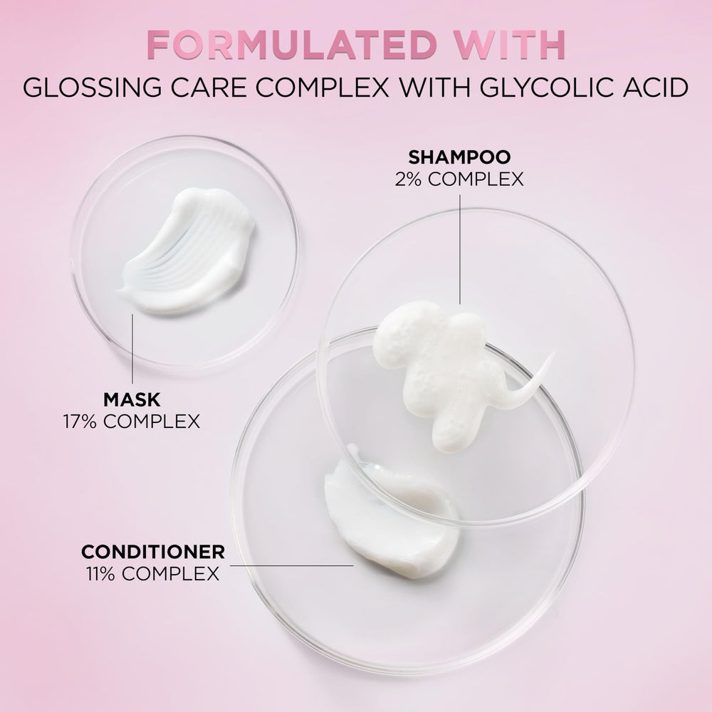 L'Oreal Paris mask being rinsed from hair showing easy washout benefit
