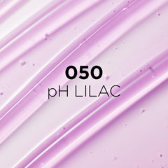 Color-change swatch shows pink tint adapting to lip pH with L'Oreal Paris Plump Ambition.