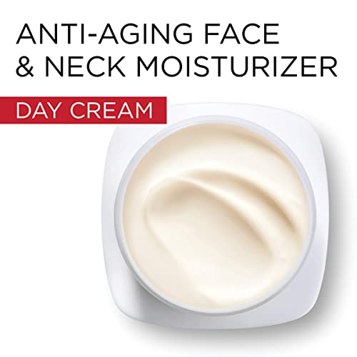 L'Oreal Paris Revitalift day cream swirl on finger ready for application.