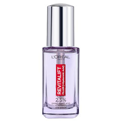 L'Oreal Paris Revitalift Filler Eye Serum cooling beads applicator ready for massage.
