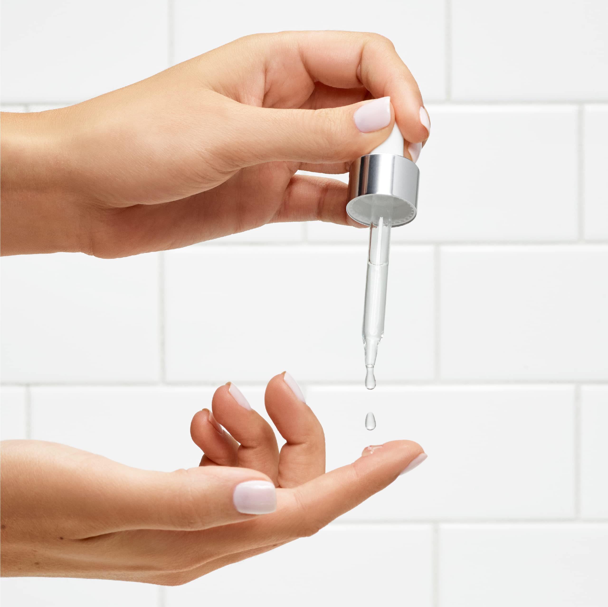 L'Oreal Paris Revitalift fragrance-free label emphasizes dermatologist-validated, gentle care.