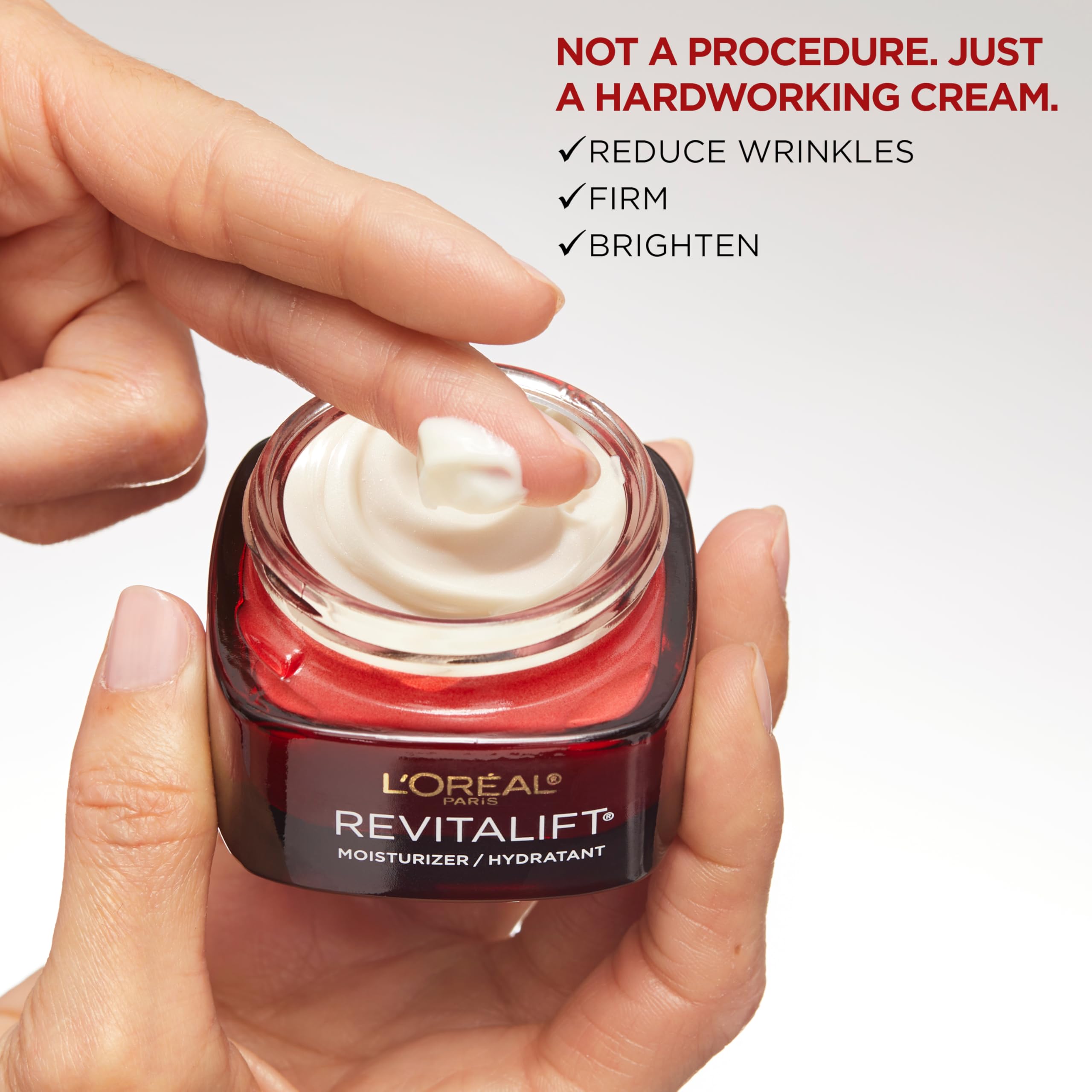 Dermatology-tested and allergy-tested badge for safety of Revitalift fragrance-free formula.