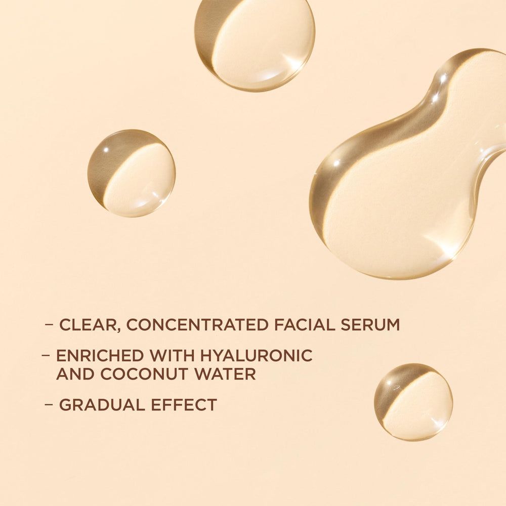 L'Oreal Paris Sublime Bronze facial drops moisturizer-mix shows creamy, non-sticky texture.