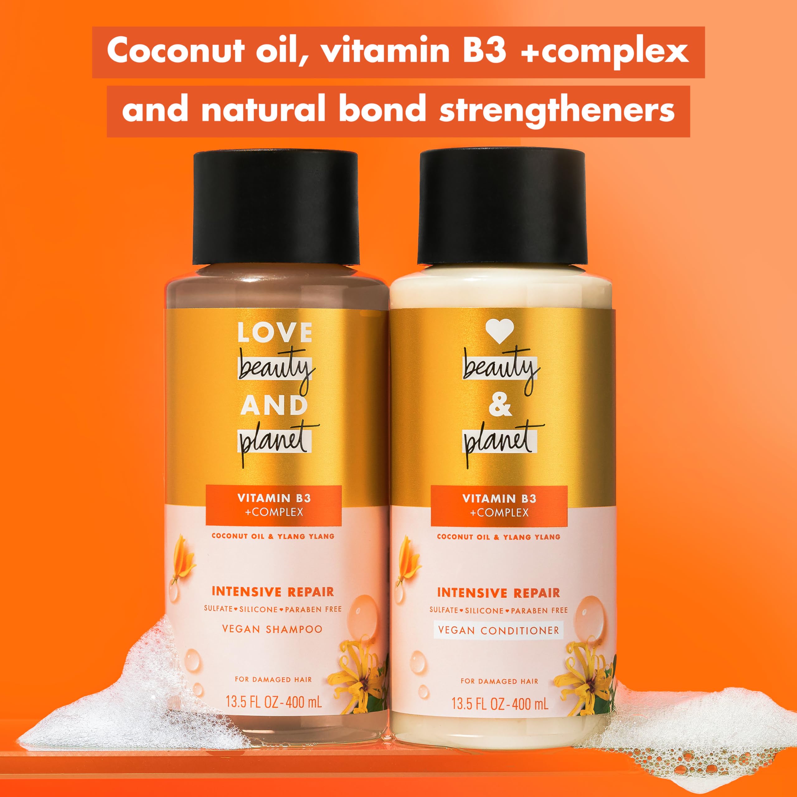 Love Beauty and Planet shampoo lather surface shows rich creamy foam for gentle cleansing.
