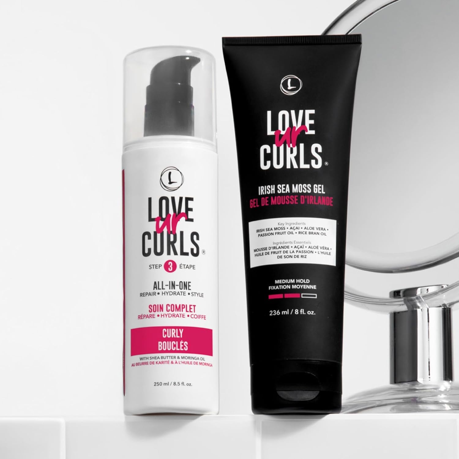 Love Ur Curls hands applying curl cream for smooth styling.