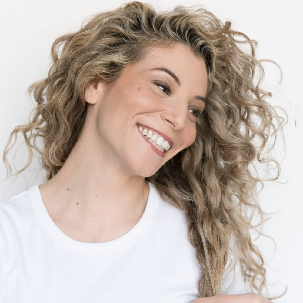 Love Ur Curls on hands shows quick, mess-free wave definition.